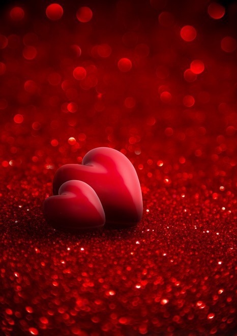 two red hearts with glitter for background of Valentine day